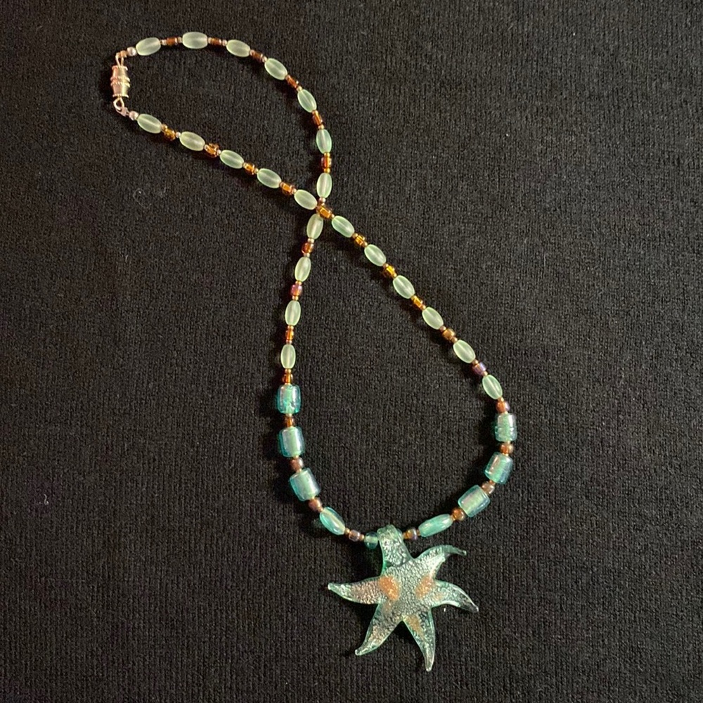 Lovely translucent beaded aqua necklace 16 inch with starfish